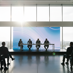 Illustration of a corporate event and speaker panel