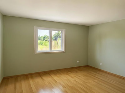 An empty room after all clutter is removed with Decor8 AI object removal API