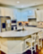 Clean kitchen with island, house cleaning Bellevue WA.