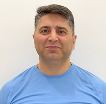 Omid Ramez, corrective Pilates and fitness specialist at Parsa Wellness Clinic leading rehab Pilates and functional training to improve mobility and prevent injury.