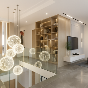 Modern mezzanine living area featuring a glass railing, statement dandelion pendant lights, and a custom built-in wooden shelving unit with vertical slat details by Velora Interior.