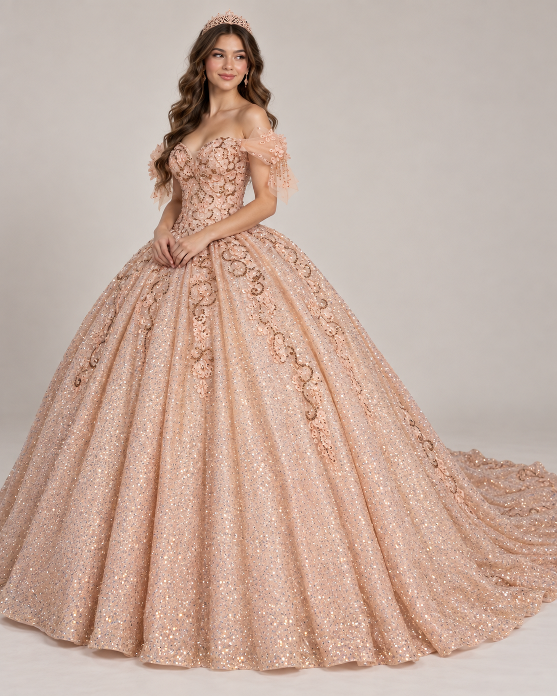 Front view of the Pink off-the-shoulder quinceañera ball gown with glitter tulle and embroidered details