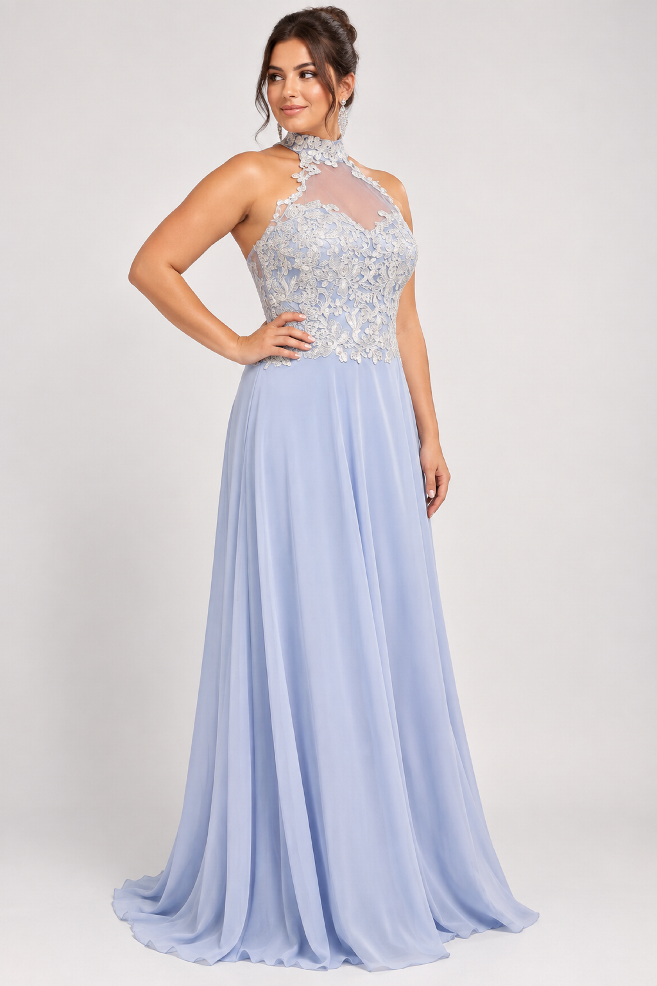 Side view of the model wearing the blue party, prom, evening dress with the front view showing the dress slit