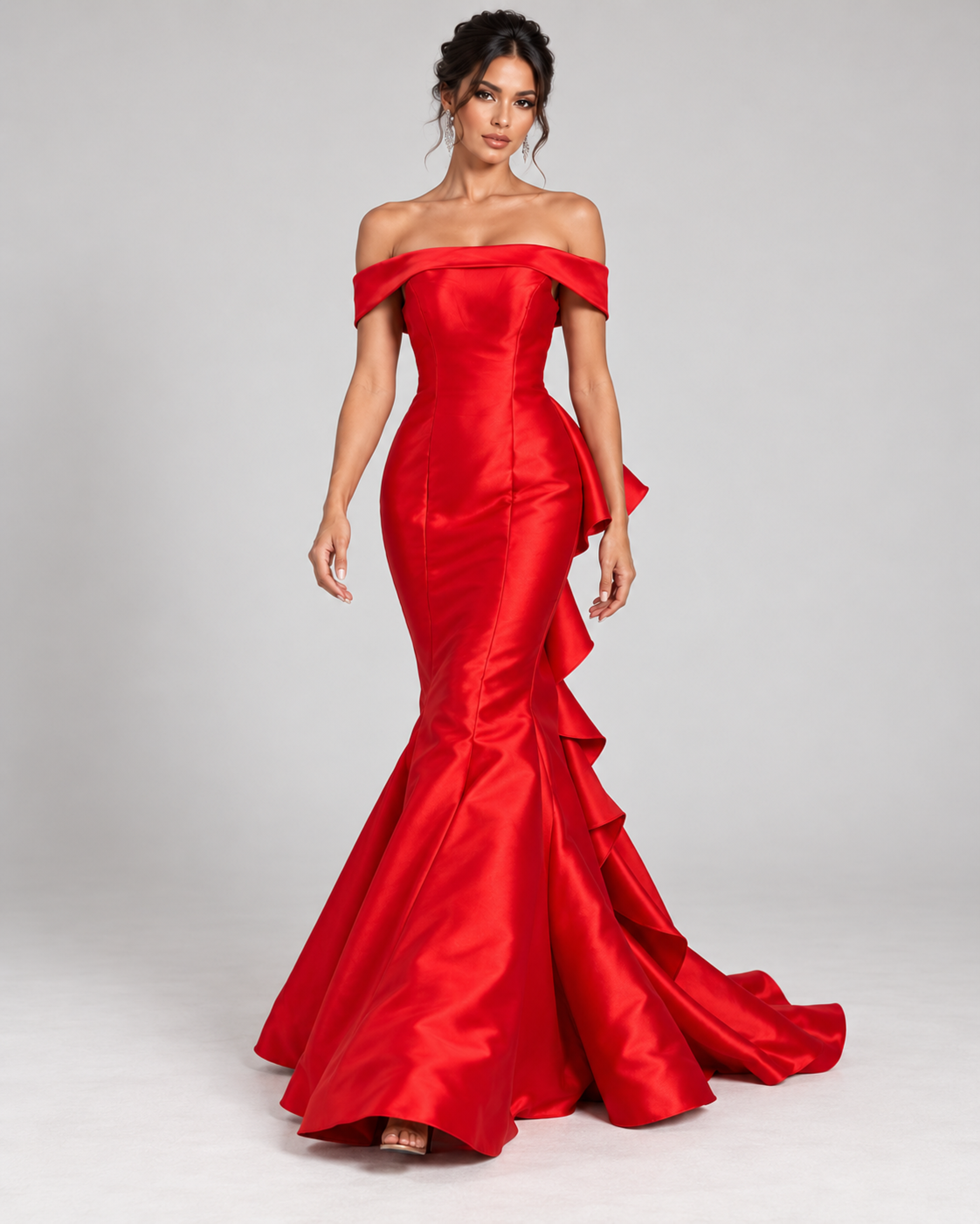 Front view of model showing red satin off-the-shoulder evening gown with a mermaid silhouette and back ruffles.