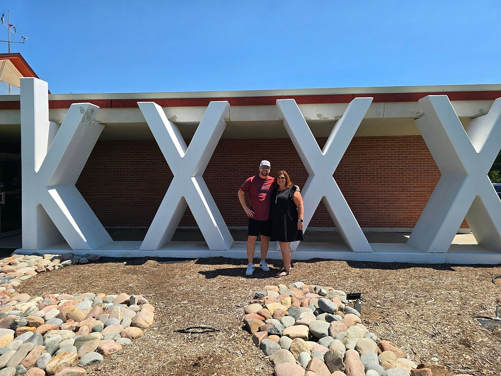 Dallas Pryor with NWKS Radio's Kristina at the NWKS Radio Studios in Colby KS