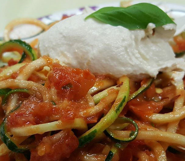 Creamy sauce over zucchini noodles