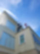 Soft washing and pressure washing a 3 story mansion