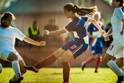 Female soccer players in action