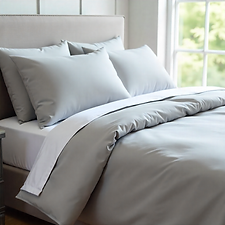 freepik__studio-shot-of-a-beautifully-made-bed-featuring-a-__97374.png