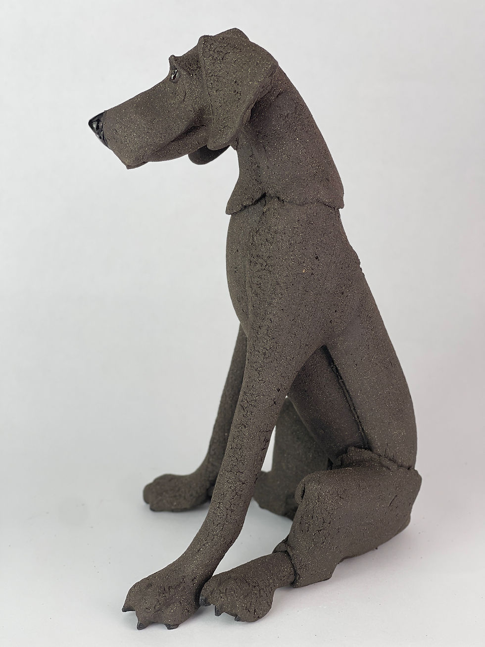 Thumbnail: Black ceramic sitting dog