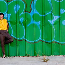 Girl on Green Wall