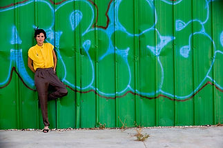 Girl on Green Wall