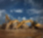 multiple diggers on site