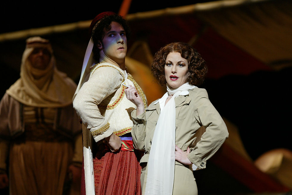 Ali (David Giuliano) and Isabella (Jennifer Dudley) at the site of a plane crash; photo by Ellen Appel.
