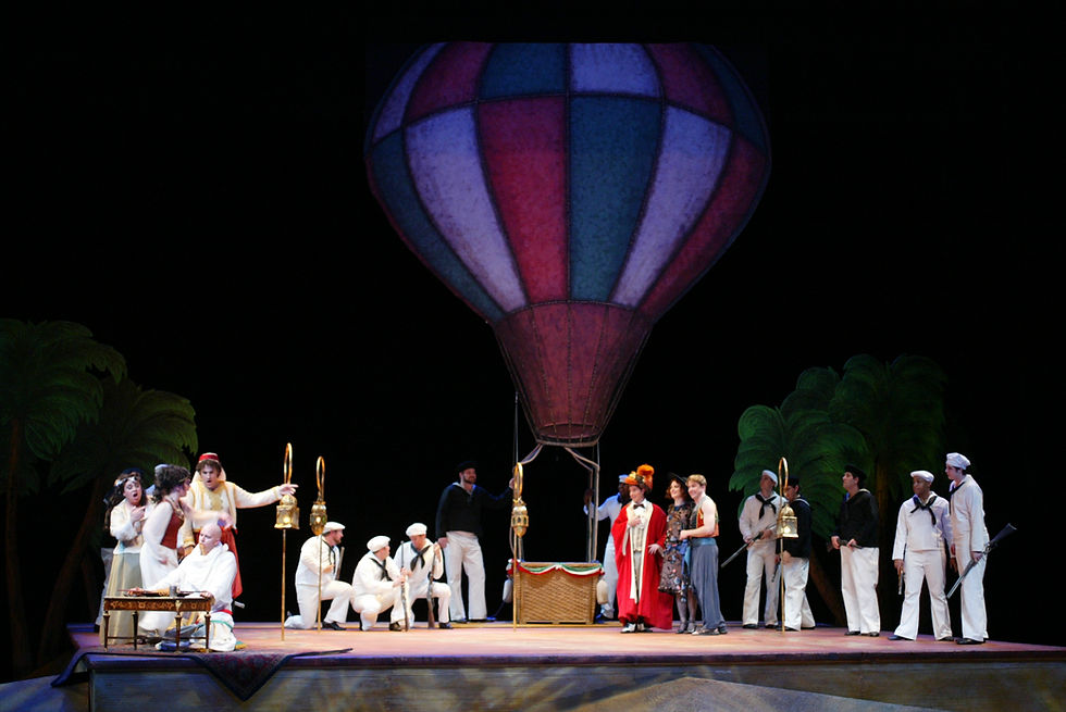 Isabella and Lindoro (Jennifer Dudley and David Adams) prepare to leave in a hot air balloon; photo by Ellen Appel.