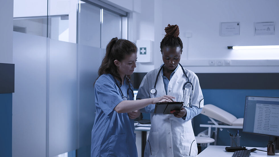 doctor-and-nurse-working-with-tablet-for-healthcar-2021-12-09-06-11-20-utc_edited.jpg