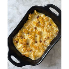 Pasta gratinada con crema de coliflor, cheddar, jamón y provolone