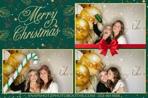 Group of girls posing together in a festive Christmas photo booth template with gold and white ornament backdrop in Ocala FL