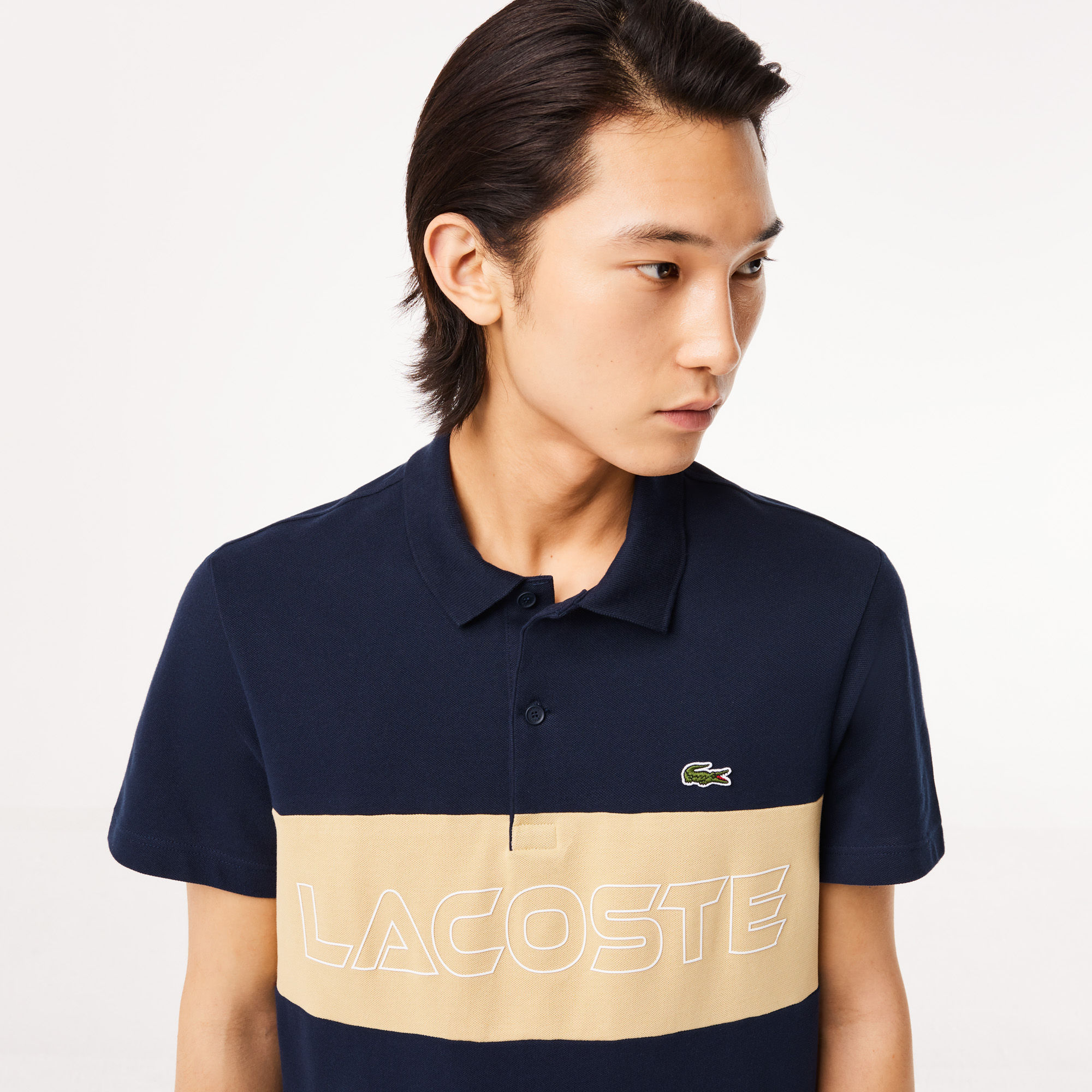 LACOSTE Polo color block regular fit in piqué elasticizzato