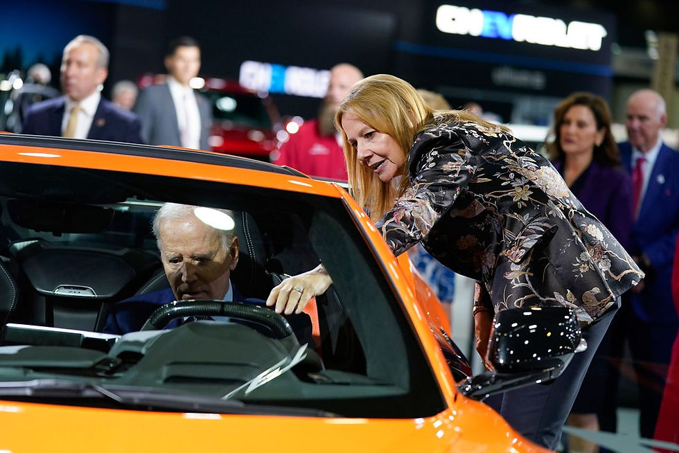 Biden talking about EV vehicles with Mary Barra, CEO of General motors.