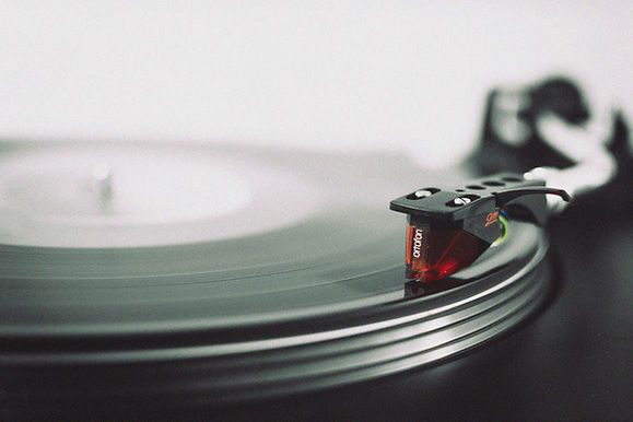 Close-up of a vinyl record playing.