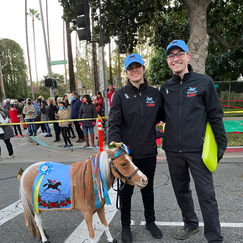 Mini Therapy Horses volunteers Sophia and Reed with horse Louise.