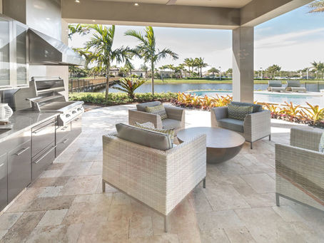 Neutral outdoor living space overlooking a community lake