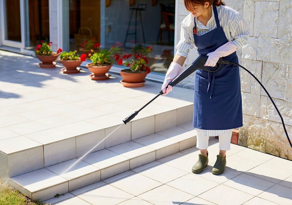 Woman Power washing Outdoor Lanai Tile