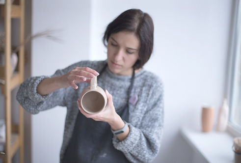 Potter Making Mug