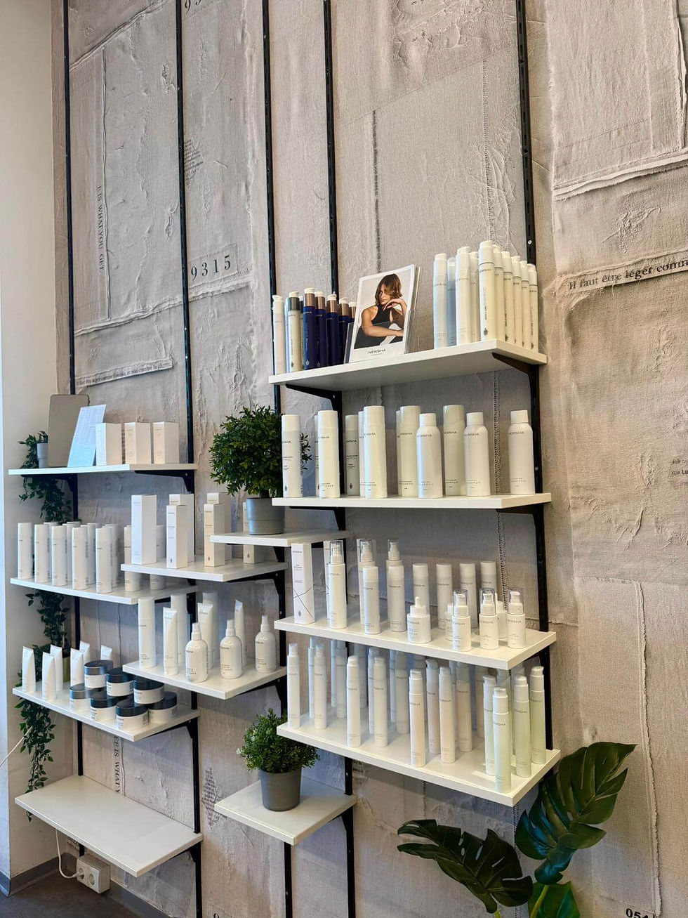 Newsha Produktwand Friseursalon Graz Schnitt Atelier.jpeg
