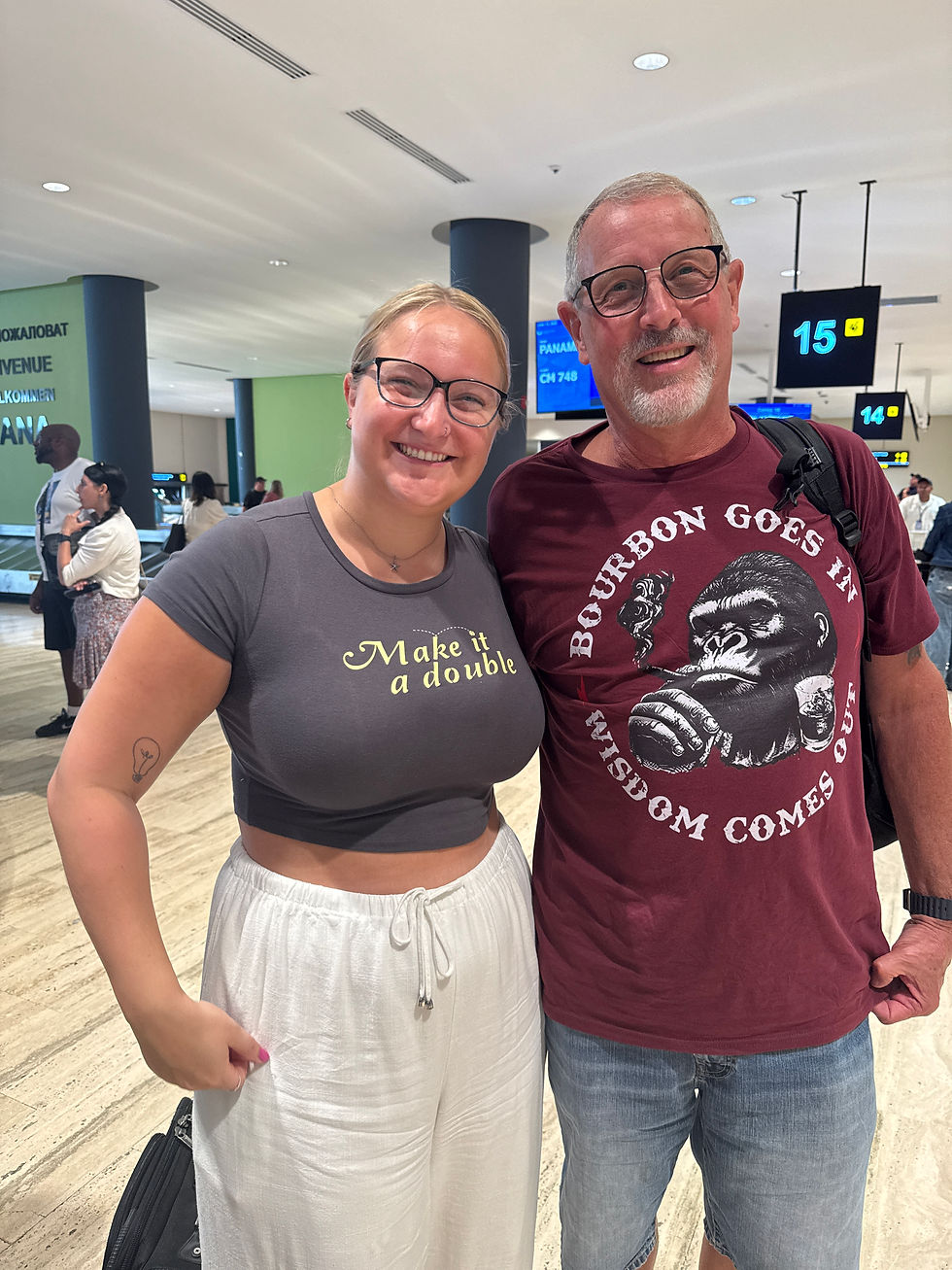 young woman smiling with her father