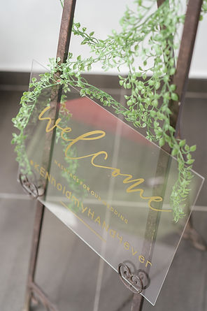 Transparent welcome signage