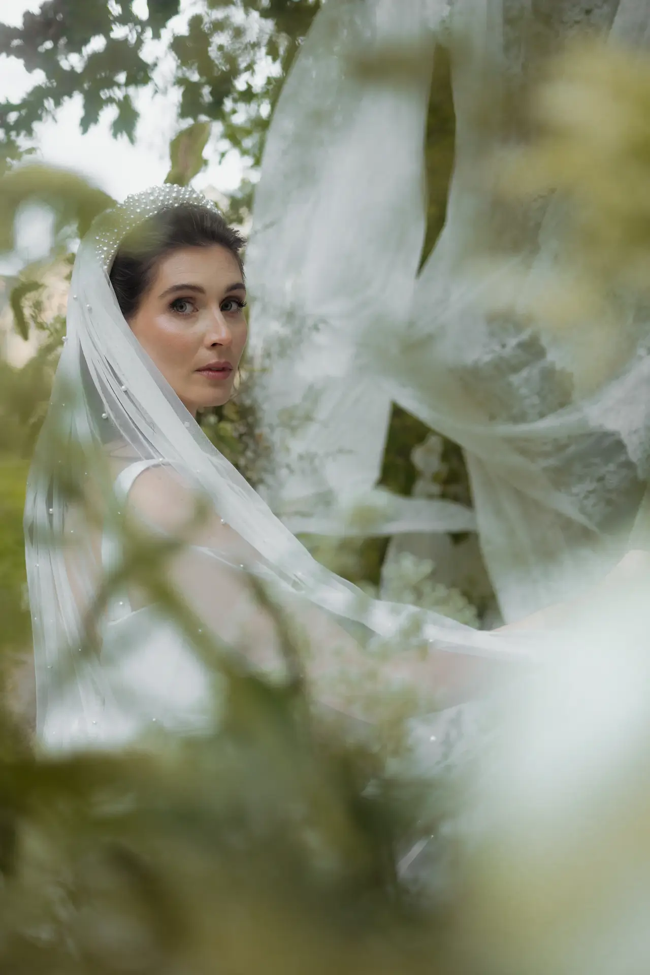 Portrait Braut mit Spitzenschleier