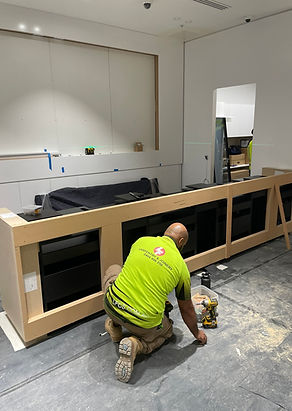 LFCS Carpenter working on the Sephora Cashier Counter