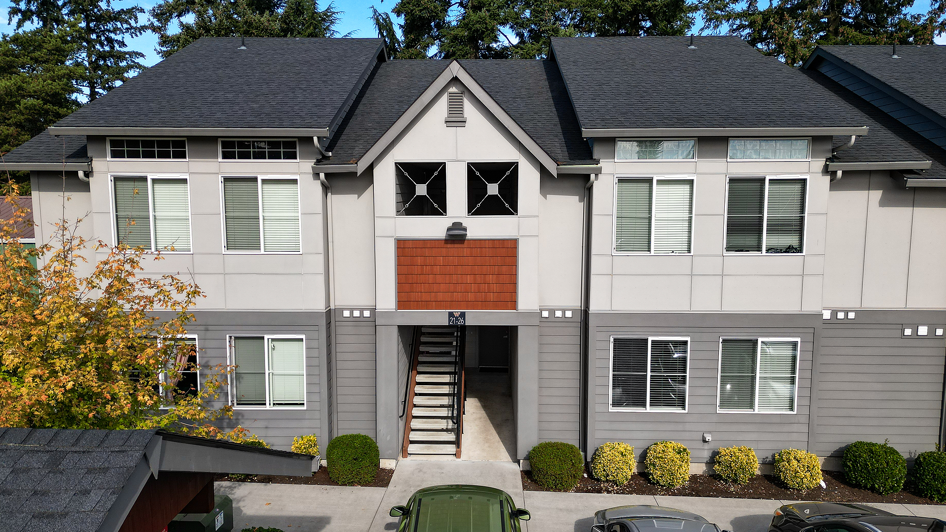 Mid-day aerial photo showing the contemporary exterior design of Wingate Square Apartments after commercial siding, soffit & window installation by StraightLine Exteriors in Vancouver, Washington 98662.