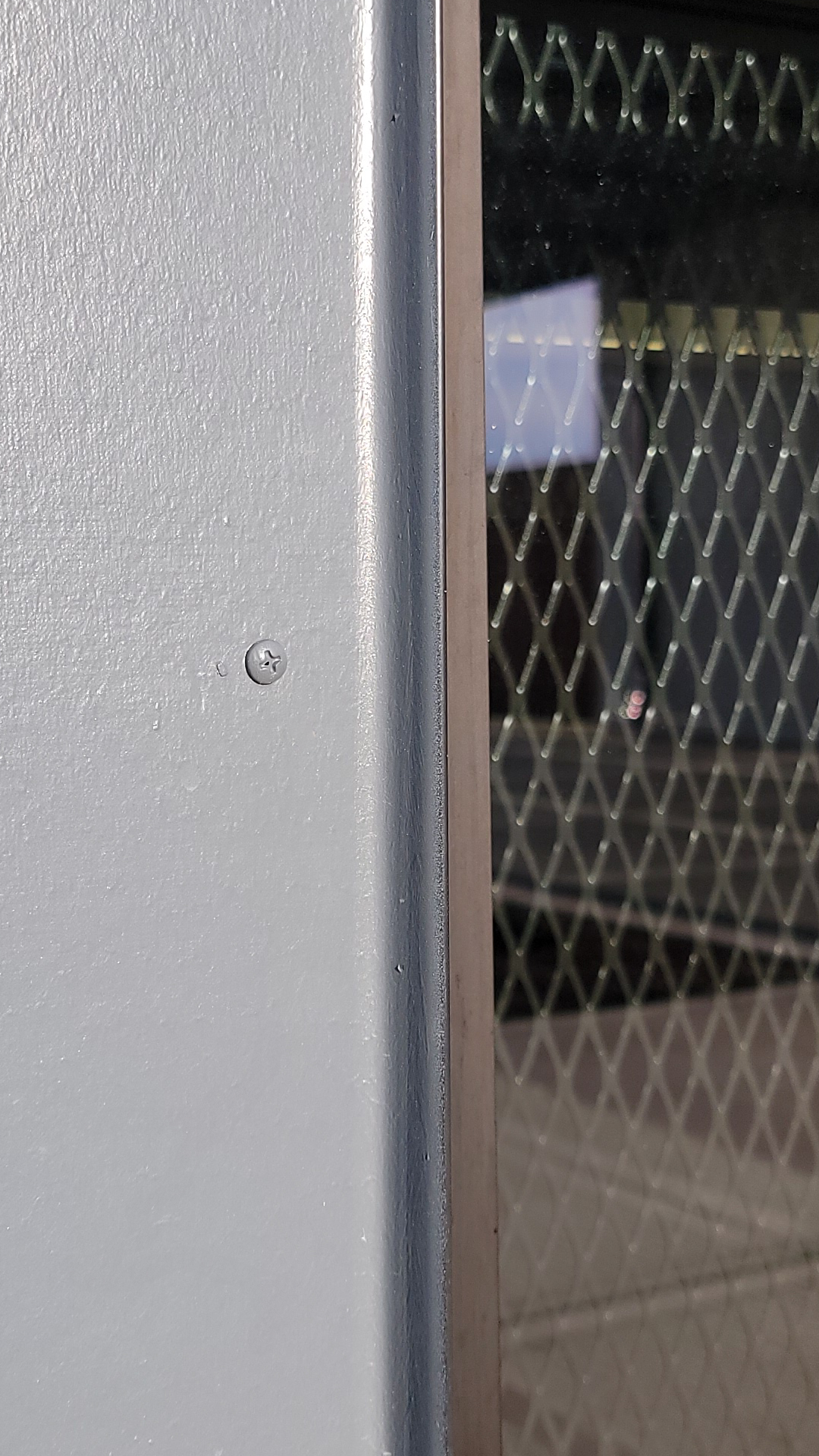 Close-up product photography of Tamlyn® XtremeTrim® in Black Anodized Aluminum outside detail. This important part of the building envelope is custom designed to promote maximum weatherization and drainage of Northwest Line Joint Accreditation Training Center. Commercial siding, flashing & waterproofing by StraightLine Exteriors in Battle Ground, Washington 98604. 