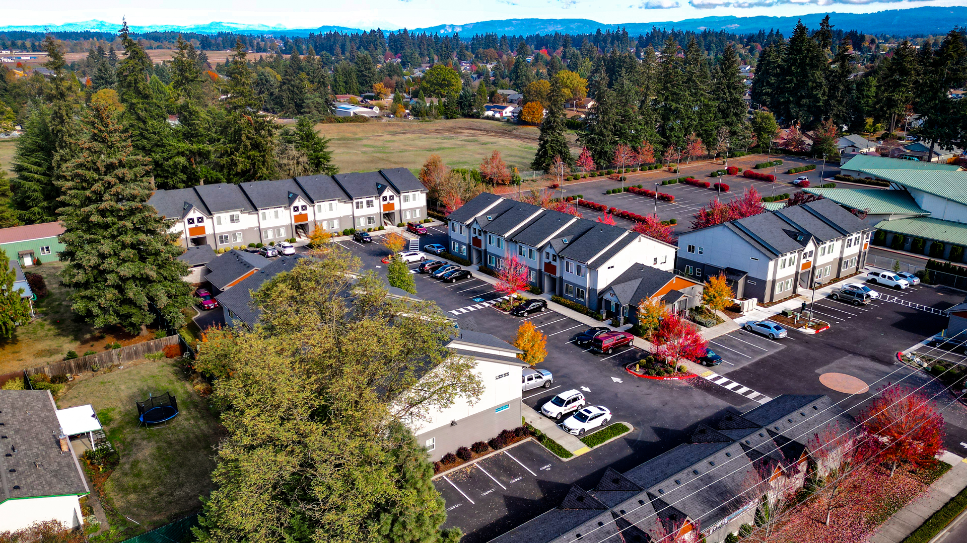 Mid-day aerial photo showing the size, scale & location of Wingate Square Apartments after commercial siding, soffit & window installation by StraightLine Exteriors in Vancouver, Washington 98662.
