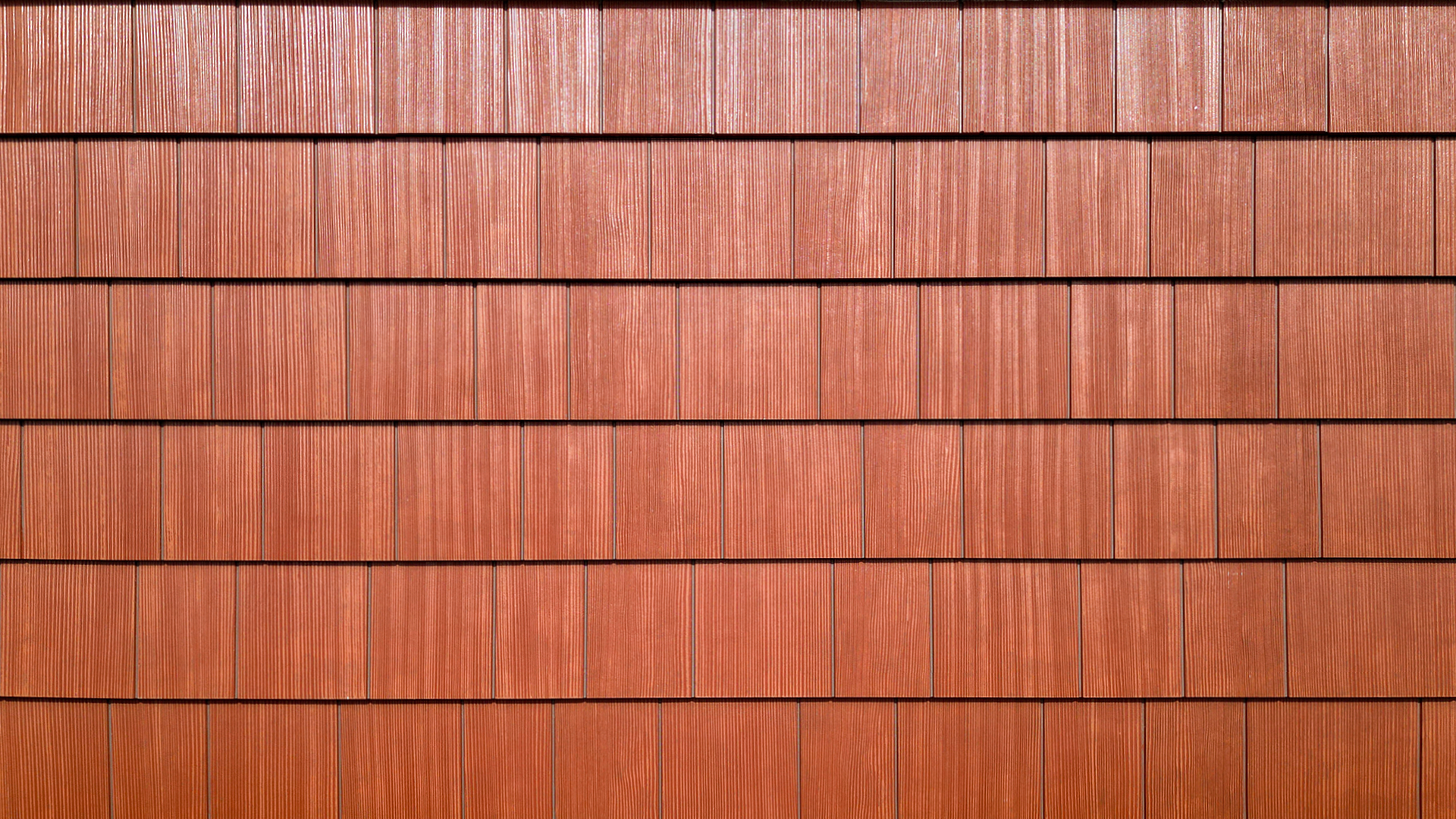 Large, close-up product photo showing the color, texture and scale of Nichiha USA® Sierra Premium Shake in Maple. Photo taken at Wingate Square Apartments after commercial siding, soffit & window installation by StraightLine Exteriors in Vancouver, Washington 98662.