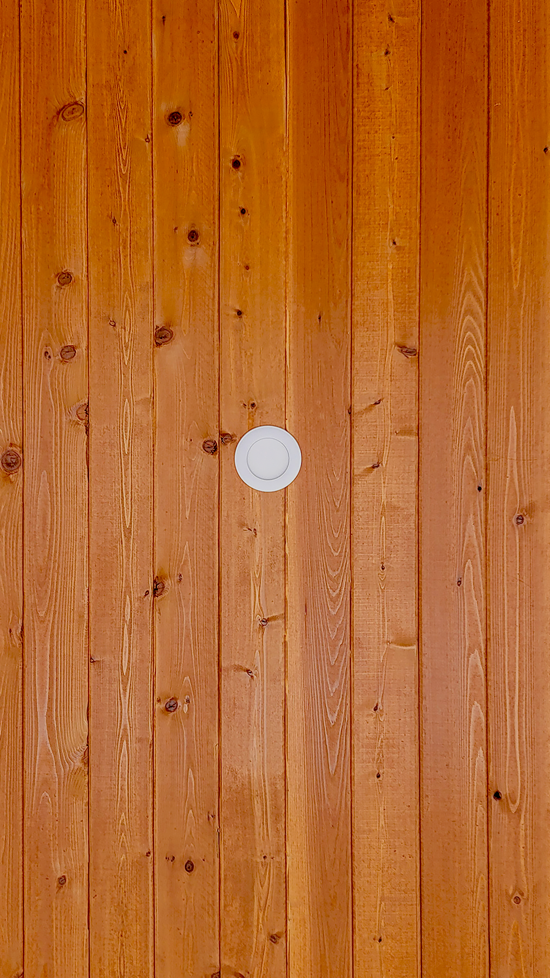 Stained tight knot (TK) cedar 1x6 T&G (Tongue and Groove) Soffit product photo of Cascade Furniture & Mattress after commercial siding, soffit, post & beam installation by StraightLine Exteriors. 
