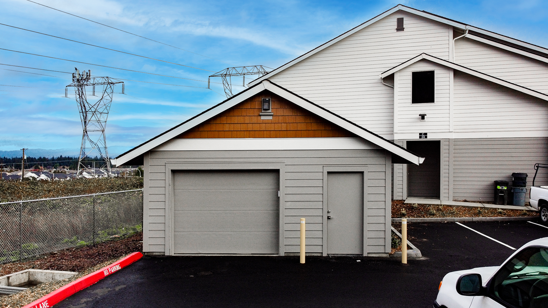 Photo detailing Commercial Siding Installation by StraightLine Exteriors of a front Mechanical Room building elevation located at Block 1618 Apartment Homes in Vancouver, Washington 98684. Photo shows installed fiber cement siding : James Hardie Products (Hardie Plank, Architectural Panels and Hardie Trim) as well as Nichiha USA (Sierra Premium Shake) and Tamlyn® Architectural Trim.
