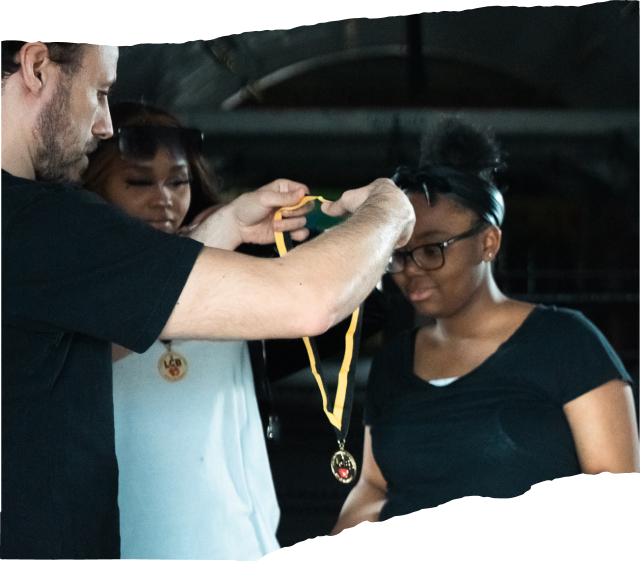 A group of young people receiving medals