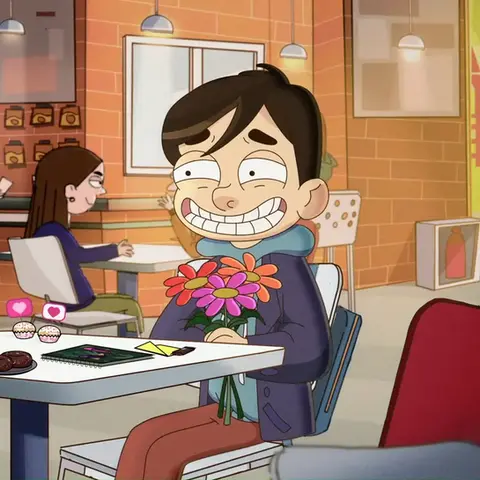 Um garoto com uma expressão ansiosa sentado em uma lanchonete de segurando um buquê de flores