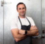 Robert, our gelato chef, in front of our freezer