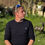 Thumbnail: Man wearing a navy cable knit jumper