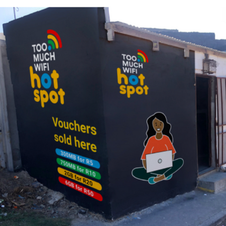 Spaza shop with new TooMuchWifi wall branding after the redesign