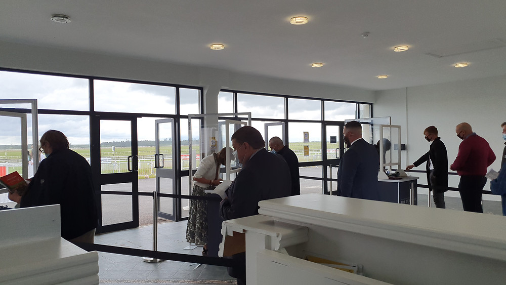 Socially distanced racegoers at the Curragh's first fixture open to the public