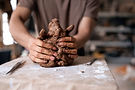 front-view-man-clay-sculpting.jpg