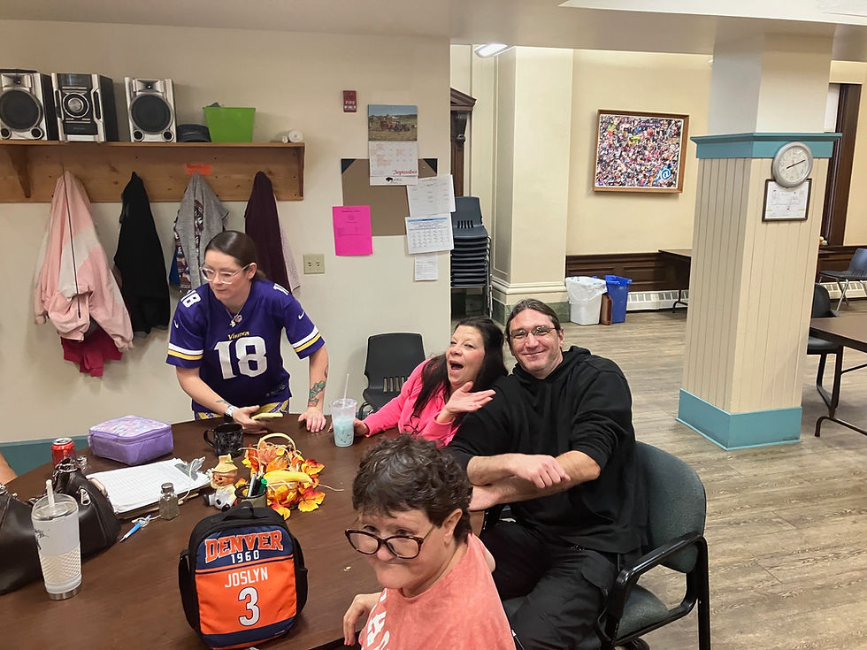 Day Coordinator Ceirra with Direct Service Professionals  Teresa and Kevin hamming it up for the camera