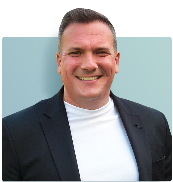 "Simon Linstead, President and Co-Founder of Simple Security, smiling in a black blazer and white shirt against a light blue background