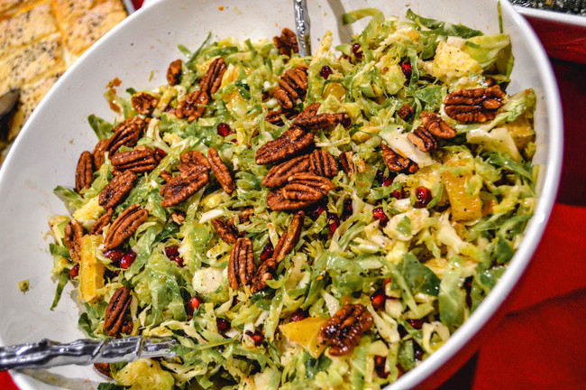 BRUSSELS SPROUTS SALAD WITH POMEGRANATE ORANGE VINAIGRETTE AND PECANS